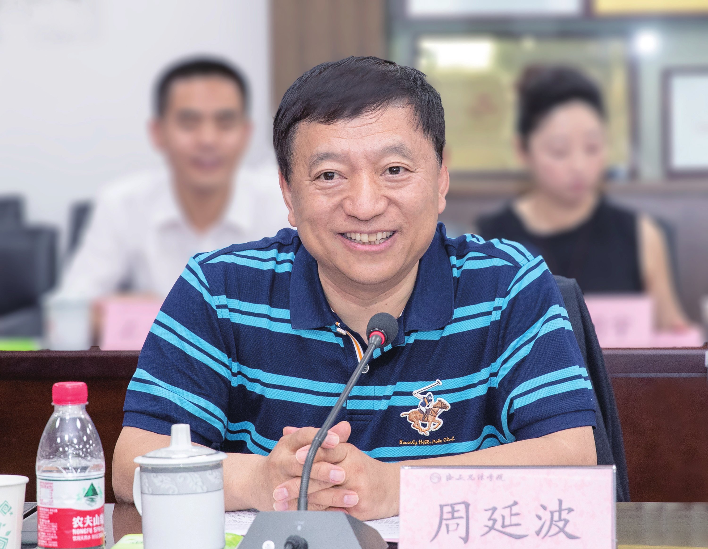 浙江树人大学徐绪卿校长一行在我校座谈交流周延波董事长热情会见来宾并出席座谈活动