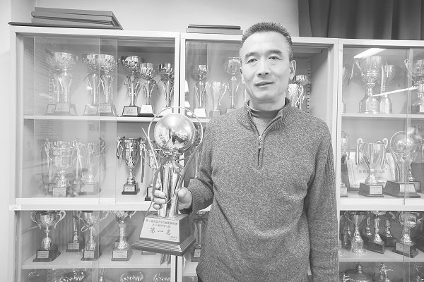 王建军：亦师亦友的金牌教练